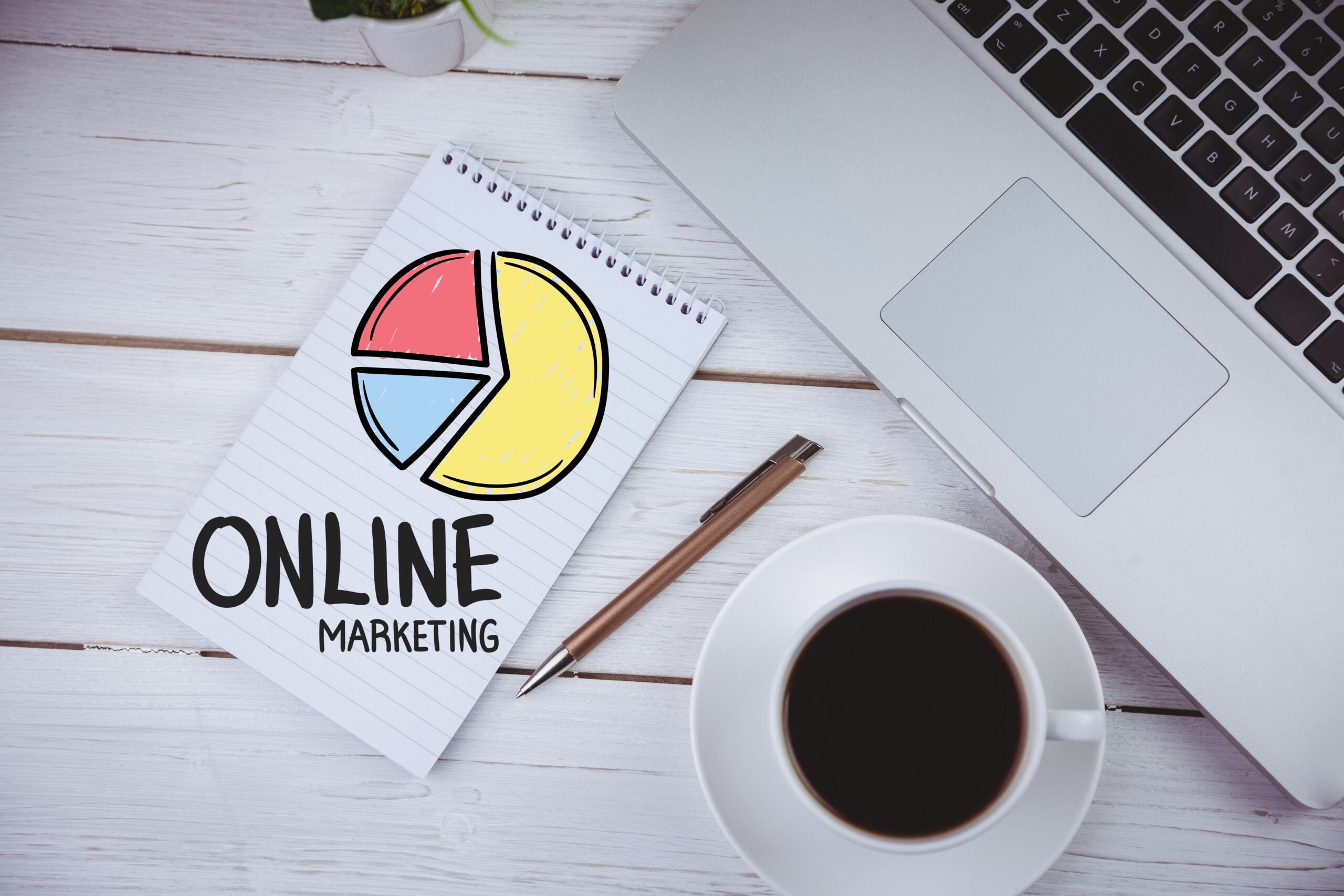 notebook-with-words-online-marketing-cup-coffee